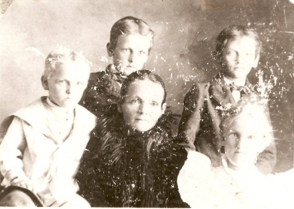 A group of people posing for a photo

Description automatically generated